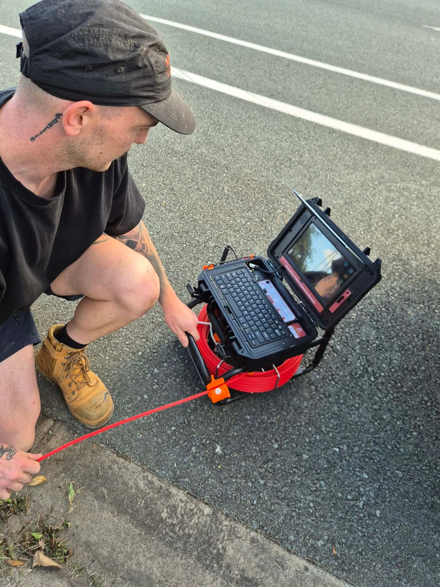 CCTV drain camera inspection at the kerb